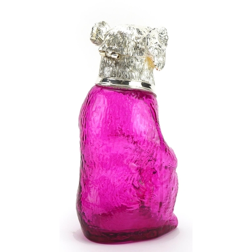 102 - Cranberry coloured glass claret jug in the form of a bear with silver plated mount, 22cm high