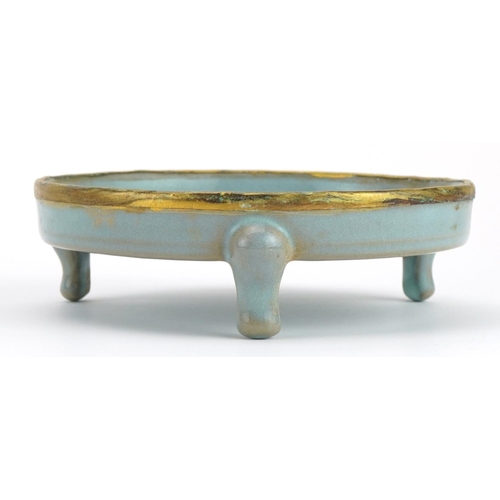 269 - Chinese porcelain tripod censer having a blue glaze, 14cm in diameter