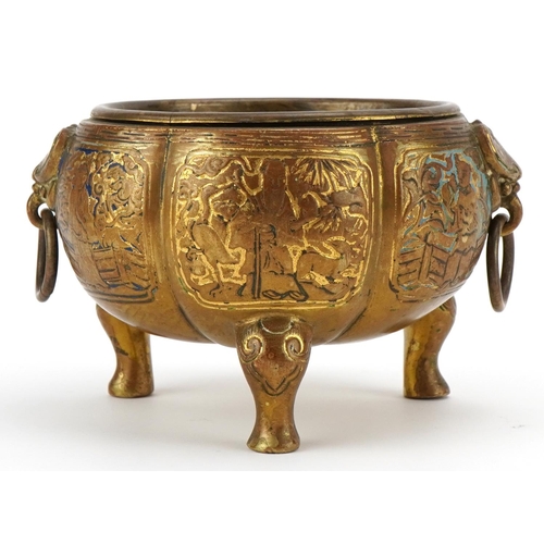 392 - Chinese brass censer with ring turned animalia handles, decorated with figures, 16cm wide