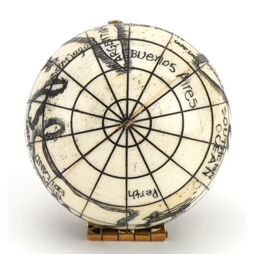 427 - Naval interest carved bone pocket globe compass, 7cm in diameter