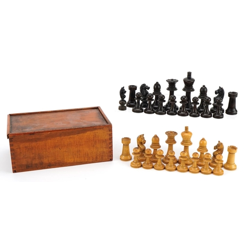 1401 - Boxwood and ebonised Staunton pattern chess set with wooden case, the largest pieces each 8.5cm high