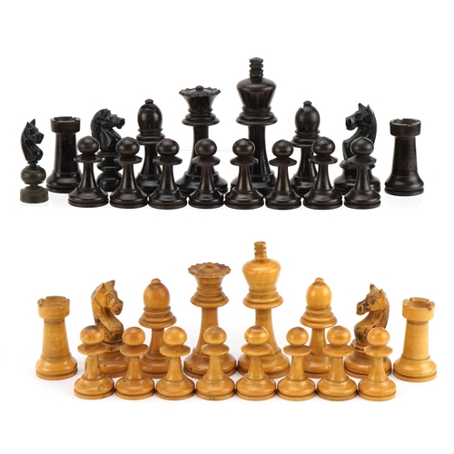 1401 - Boxwood and ebonised Staunton pattern chess set with wooden case, the largest pieces each 8.5cm high