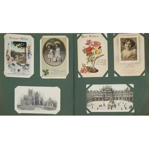 1952 - Early 20th century and later topographical and social history postcards arranged in an album, some r... 