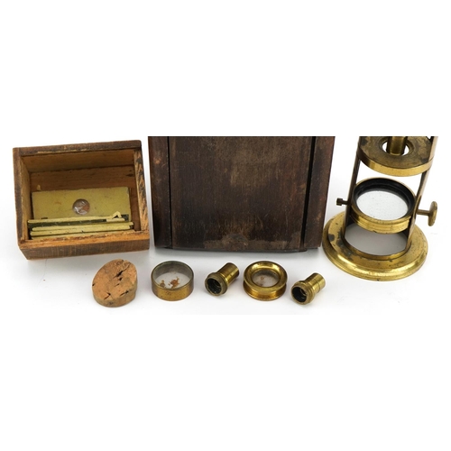 151 - 19th century brass student's microscope with case and accessories, 20.5cm high