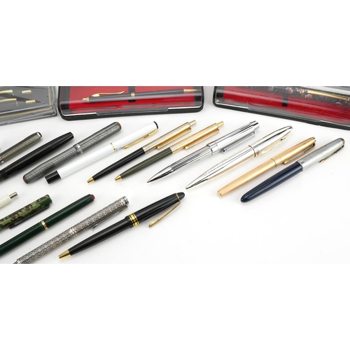 76 - Vintage and later fountain pens and ballpoint pens including Parker and Sheaffer, one with 14ct gold... 