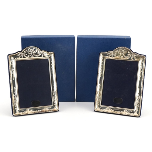 1846 - Carr's of Sheffield, pair of silver easel photo frames embossed with swags, each Chester 1997, 17cm ... 