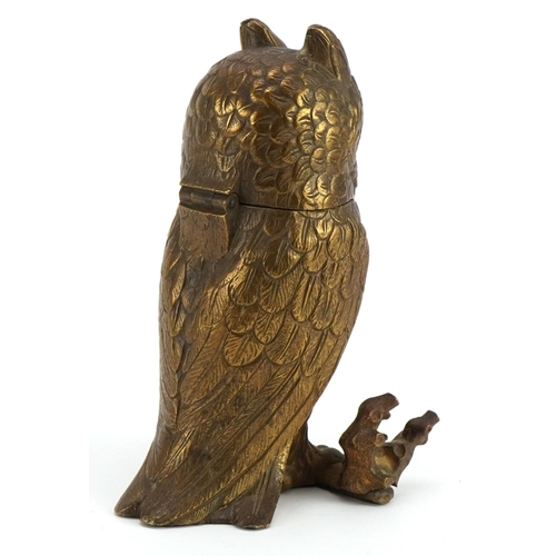 428 - Victorian bronze inkwell in the form of an owl with beaded eyes having a hinged lid house a ceramic ... 