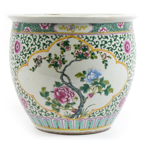 120 - Large Chinese porcelain jardiniere hand painted in the famille rose palette with flowers and Daoist ... 