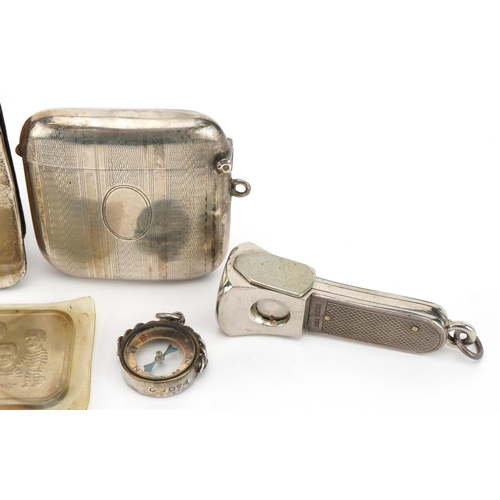 1834 - Silver objects including a vesta, cigar cutter and one ounce The Watergate Gang fine silver ingot, t... 