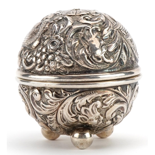 1814 - William Comyns, Victorian silver string box embossed with birds amongst foliage raised on three ball... 