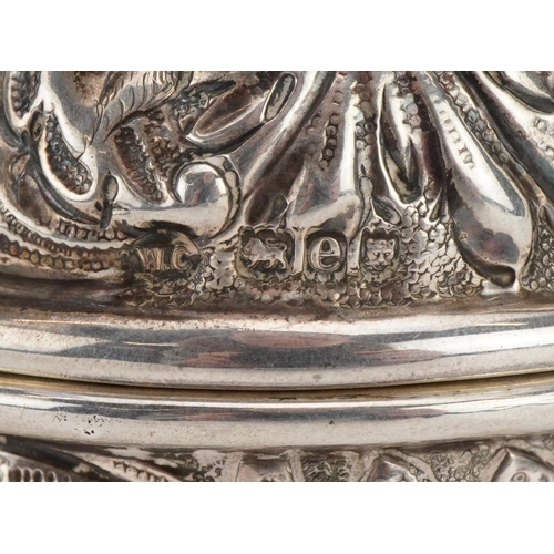 1814 - William Comyns, Victorian silver string box embossed with birds amongst foliage raised on three ball... 