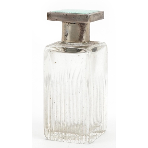 1821 - William Neale & Son Ltd, Art Deco cut glass scent bottle with silver and green guilloche enamelled l... 