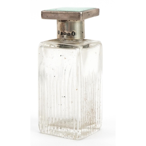 1821 - William Neale & Son Ltd, Art Deco cut glass scent bottle with silver and green guilloche enamelled l... 