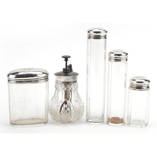 1847 - Four cut glass jars with silver lids and a Victorian cut glass atomiser with silver coloured metal l... 