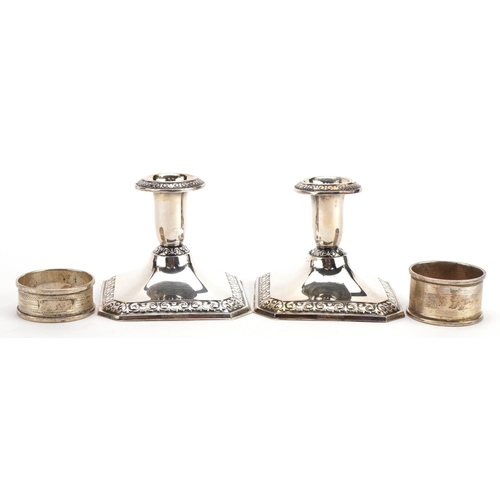 1850 - Pair of continental 813 grade silver square based dwarf candlesticks and two circular silver napkin ... 