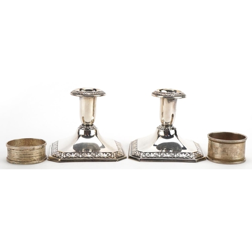 1850 - Pair of continental 813 grade silver square based dwarf candlesticks and two circular silver napkin ... 