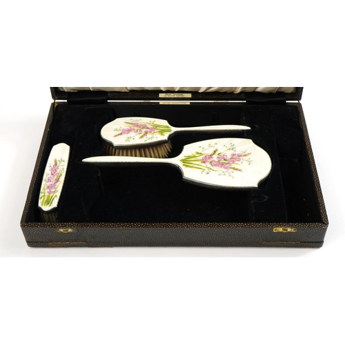 1875 - William Suckling Ltd, George VI silver and enamel three piece dressing table set housed in a Gertrud... 