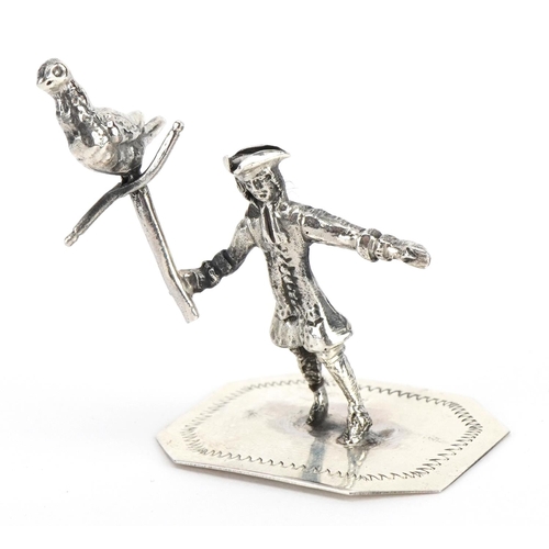 1826 - Miniature sterling silver figure of a gentleman holding a bird on a perch, 4cm high, 13.5g