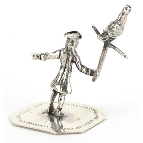 1826 - Miniature sterling silver figure of a gentleman holding a bird on a perch, 4cm high, 13.5g