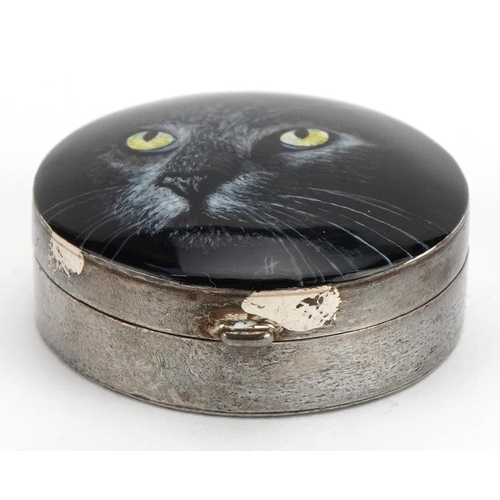 1858 - Circular silver and enamel pillbox with hinged lid decorated with a black cat, housed in a GH Pressl... 