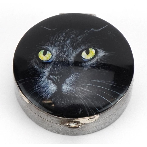 1858 - Circular silver and enamel pillbox with hinged lid decorated with a black cat, housed in a GH Pressl... 