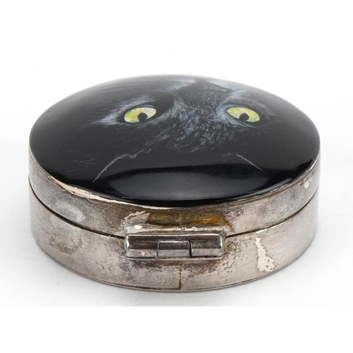 1858 - Circular silver and enamel pillbox with hinged lid decorated with a black cat, housed in a GH Pressl... 