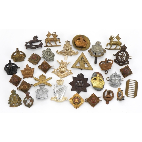 1768 - Military interest cap badges and buttons including On War Service and Royal Irish Rangers