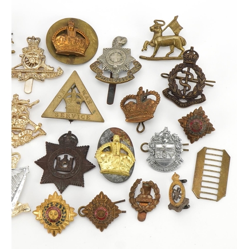 1768 - Military interest cap badges and buttons including On War Service and Royal Irish Rangers