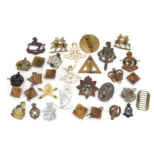 1768 - Military interest cap badges and buttons including On War Service and Royal Irish Rangers