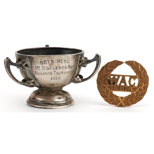 1863 - Military interest silver trophy and a WAC India cap badge, the trophy engraved Sgts Mess 1st Middles... 