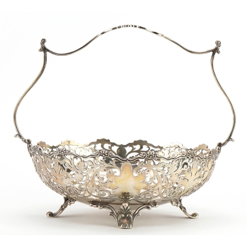 1808 - Mappin & Webb, George V silver basket with pierced foliate decoration raised on four feet, London 19... 