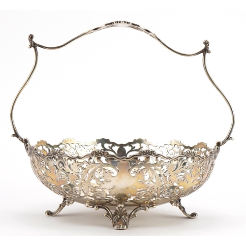 1808 - Mappin & Webb, George V silver basket with pierced foliate decoration raised on four feet, London 19... 