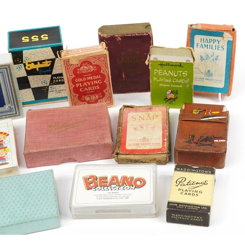 1452 - Twenty packets of vintage and later playing cards, including Muffin the Mule, Lexicon, Peanuts and B... 