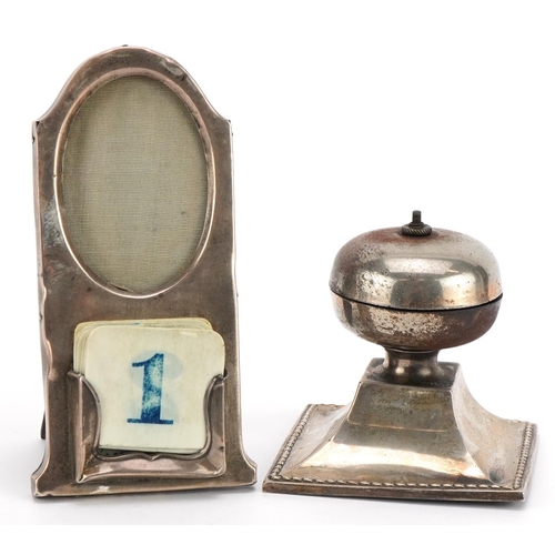 1869 - Art Nouveau silver easel desk calendar/photo frame and a table bell, the largest 14.5cm high