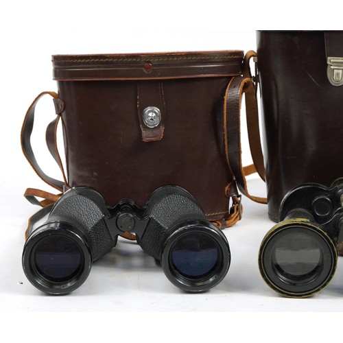 150 - Three pairs of military interest binoculars with cases including Barr & Stroud, Nippon Kogaku and Go... 