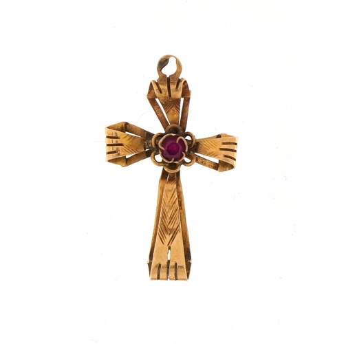 2109 - Antique 18ct gold cross pendant with engraved decoration set with a ruby, 2.6cm high, 1.1g