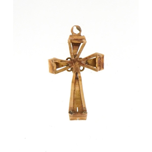 2109 - Antique 18ct gold cross pendant with engraved decoration set with a ruby, 2.6cm high, 1.1g