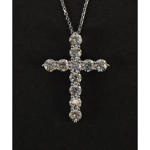 2066A - Large 18ct white gold diamond cross pendant on an 18ct white gold necklace, total diamond weight app... 