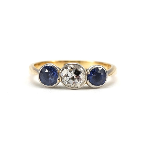 2060 - 18ct gold diamond and sapphire three stone ring, the diamond approximately 4.3mm x 4.7mm, size M, 2.... 