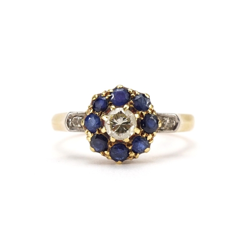 2115 - 18ct gold diamond and sapphire cluster ring with diamond set shoulders, the central diamond approxim... 