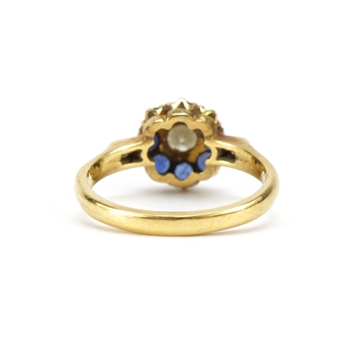 2115 - 18ct gold diamond and sapphire cluster ring with diamond set shoulders, the central diamond approxim... 