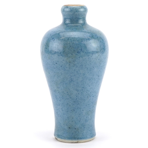 385 - Chinese porcelain baluster vase having a blue glaze, 17cm high