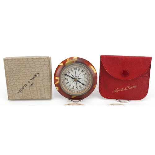 51 - Three Negretti & Zambra pocket weather forecasters and a desk compass with faux tortoiseshell mount,... 