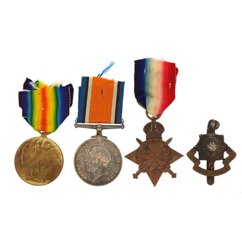 1751 - British military World War I trio and Royal Sussex Regiment cap badge, the trio awarded to 5423PTE.W... 