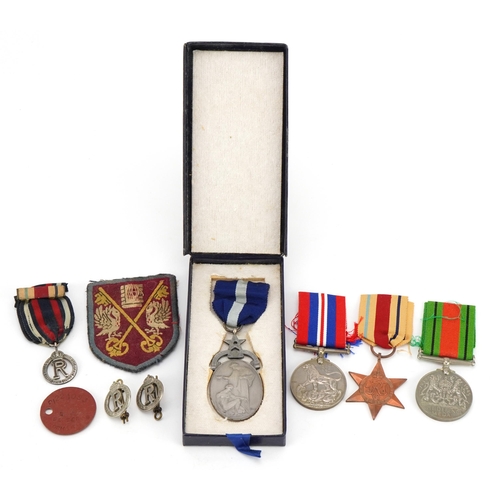 1753 - British military World War II medal group including masonic medal awarded to W Bro J M Norman, three... 