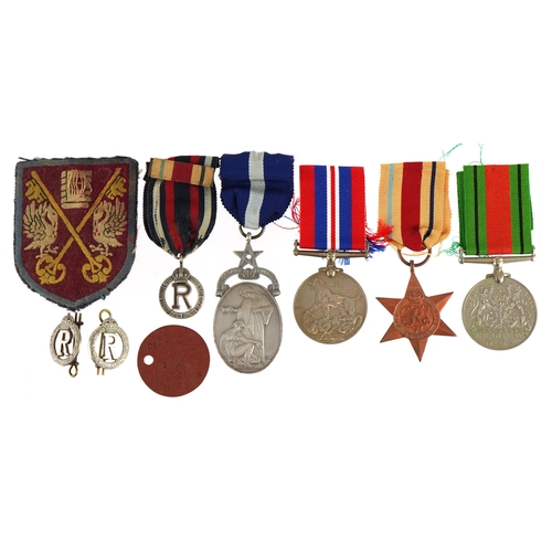 1753 - British military World War II medal group including masonic medal awarded to W Bro J M Norman, three... 