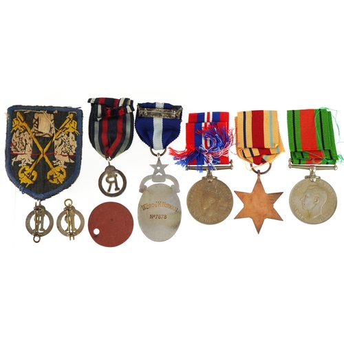 1753 - British military World War II medal group including masonic medal awarded to W Bro J M Norman, three... 