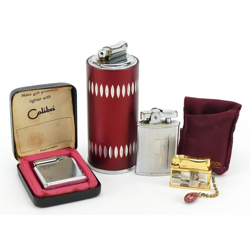 358 - Four vintage pocket and table lighters including Calibre and Ronson, the largest 12cm high