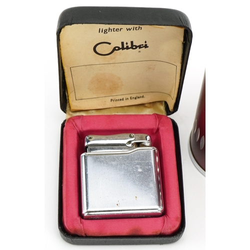 358 - Four vintage pocket and table lighters including Calibre and Ronson, the largest 12cm high