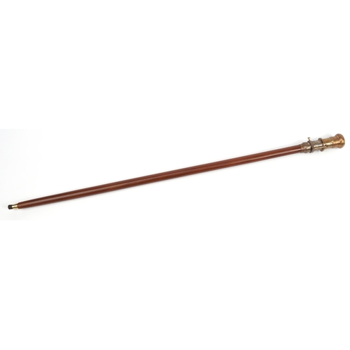 1398 - Hardwood walking stick with brass two draw compass handle, 99cm in length